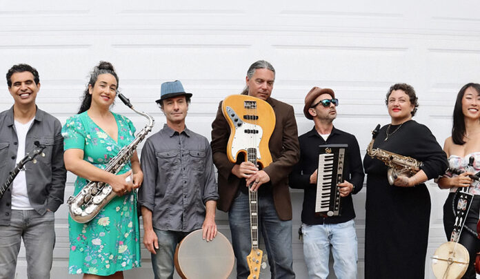 Music to Save Humanities Santa Cruz world music band AZA poses with instruments.