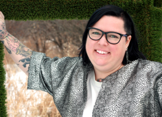 Bold Directions Ginger Shulick Porcella smiles outdoors in a portrait for the Santa Cruz Museum of Art & History.