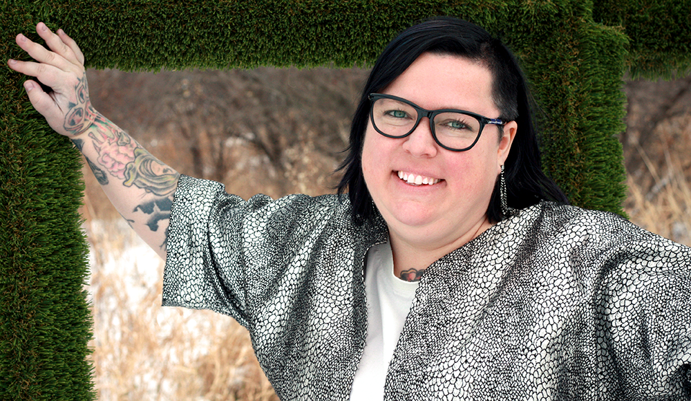Ginger Shulick Porcella smiles outdoors in a portrait for the Santa Cruz Museum of Art & History.