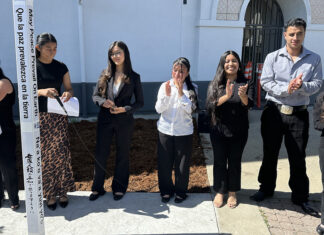 Peace Pole Watsonville High students stand beside a Peace Pole during an unveiling ceremony.