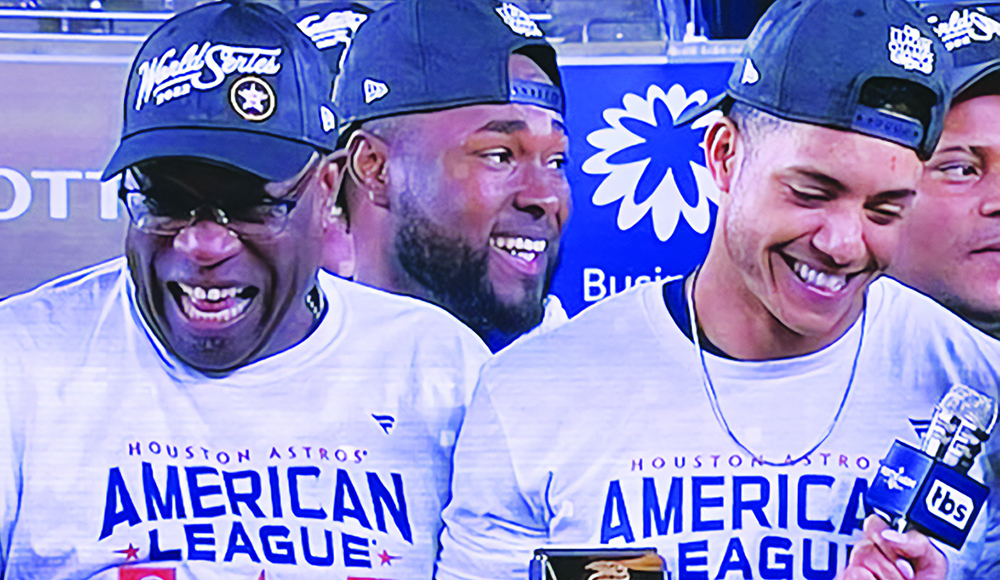 Dusty Baker celebrating with Houston Astros players
