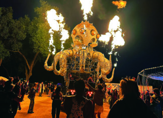 Absurdia unSCruz El Pulpo Magnifico shoots flames at night during unSCruz in Hollister.