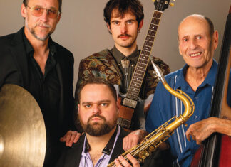 Death and Saxes Members of Santa Cruz jazz quartet Death and Saxes pose with saxophone, guitar, drums and upright bass.