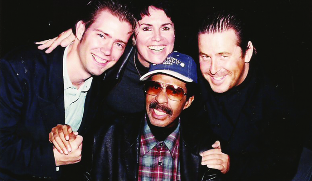 Dennis Bartok poses with Richard Pryor, Martin Lewis and Jennifer Lee Pryor in a family photo.