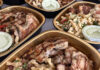 What it Takes Prepared meal trays with grilled chicken, pasta salad and sauce from Village Foods in Santa Cruz.