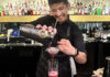 Main Place Bartender Rafael Reyes pours a pink vodka cocktail at Mane Kitchen & Cocktails in downtown Santa Cruz.