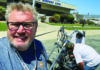 We Have Liftoff Tim Wood takes a selfie outside Woody’s at Watsonville Airport as a collectible motorcycle is moved inside.