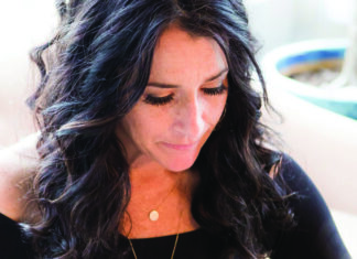 Ancient to the Future Talya Lutzker looks down thoughtfully during an Ayurveda wellness session.