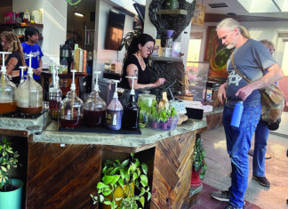 Brothers Brew Customers order drinks at the counter inside 11th Hour Coffee in Santa Cruz