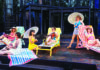 Keeping the Bard Fresh Allie Pratt as Hero relaxes on a lounge chair with other cast members in Much Ado About Nothing