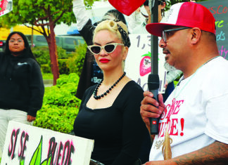 Berry ‘Greenwashing’ Suit Omar Dieguez speaks at a pesticide protest outside Driscoll’s headquarters in Watsonville