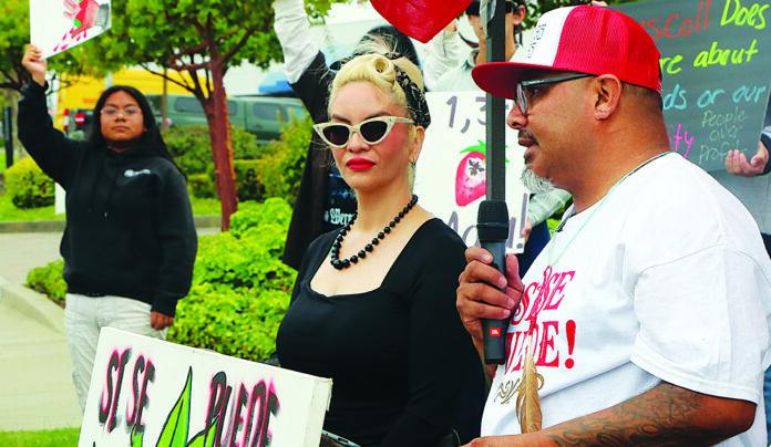 Berry โGreenwashingโ Suit Omar Dieguez speaks at a pesticide protest outside Driscollโs headquarters in Watsonville