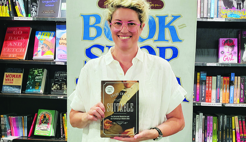 Chloe Chapin holds her book Suitable at Bookshop Santa Cruz