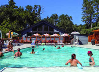 Foamy Fun Guests swim and relax beside the pool at Trout Farm Inn in Felton
