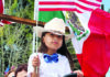 Plenty to Parade Valentina Coyt rides with flags in the Spirit of Watsonville Fourth of July Parade