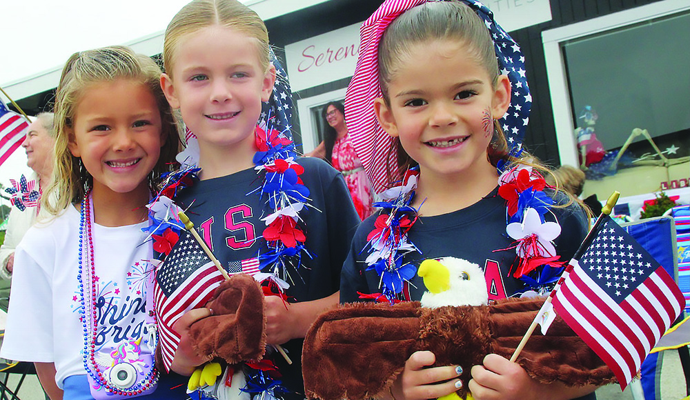 Children dressed in patriotic gear before the Aptos Fourth of July parade