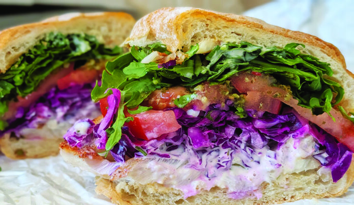 Brighten Up Blackened snapper sandwich with purple slaw, tomatoes, arugula and aioli at Seabright Deli