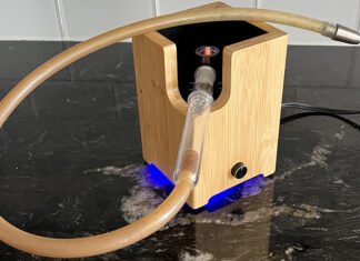 Smoke or Vape? Ditanium dry-herb vaporizer with wooden base, glass tube and hose