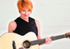 Sunny is Coming Home Singer-songwriter Shawn Colvin holding an acoustic guitar