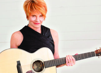 Sunny is Coming Home Singer-songwriter Shawn Colvin holding an acoustic guitar