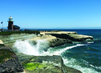 From Rockets to Oil Rigs Waves break below the lighthouse and Santa Cruz Surfing Museum at Steamer Lane.