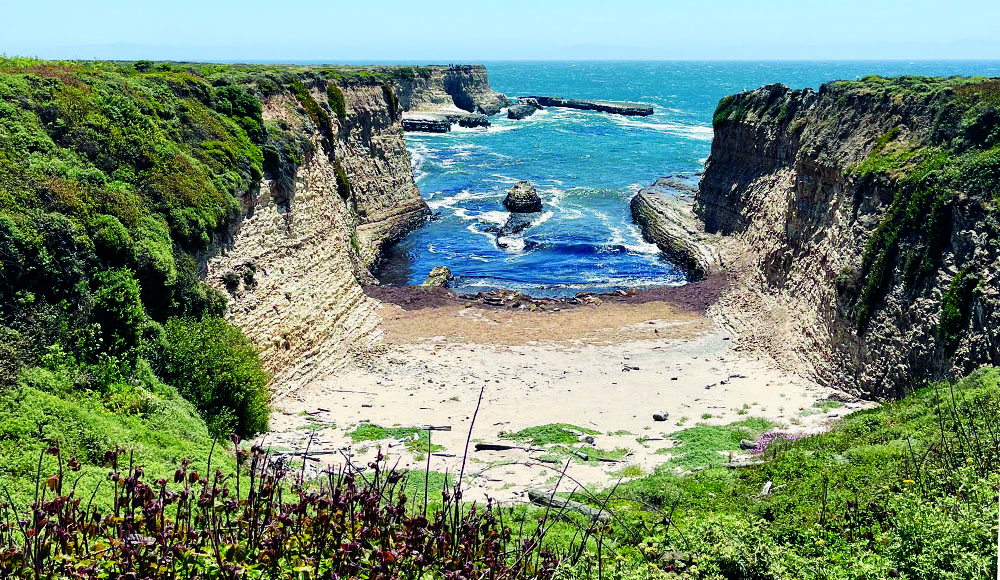 Rocky cliffs frame a secluded coastal cove at Wilder Ranch near Santa Cruz.