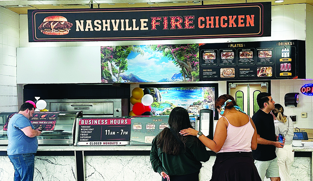 Customers order at Nashville Fire Chicken inside the Capitola Mall food court.