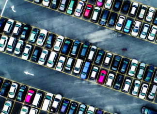 No Parking at Any Time Aerial view of a crowded parking lot illustrating UC Santa Cruz parking demand.
