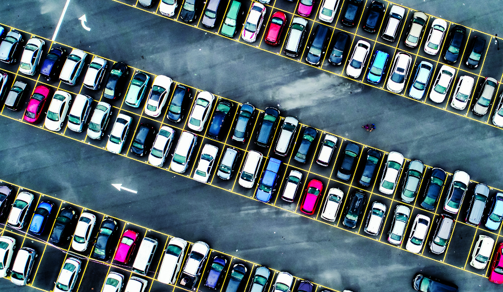 Aerial view of a crowded parking lot illustrating UC Santa Cruz parking demand.