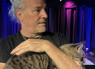 Community Hub Gone The Vessel founder Brent Adams holds a cat inside the former Santa Cruz music and community space.