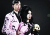 Things to do in Santa Cruz Twin Temple’s Alexandra and Zachary James pose in pink outfits with theatrical blood at their mouths, Alexandra holding a skull.