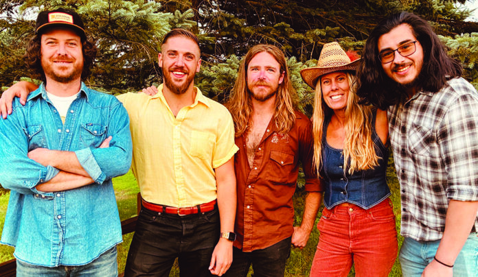 Kicking Good Time Members of Santa Cruz country and Americana band Kentucky Mule posing outdoors.