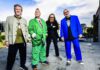 Rejecting Nostalgia Public Image Ltd band members pose outdoors