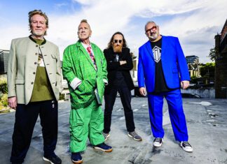 Rejecting Nostalgia Public Image Ltd band members pose outdoors