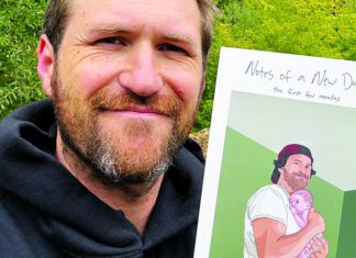 A Billion Views Joshua Turek holds his poetry book Notes of a New Dad
