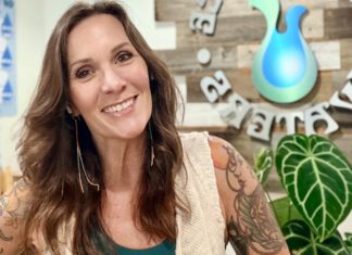 Free Water Alayna Nathe smiles inside True Source Waters in Santa Cruz