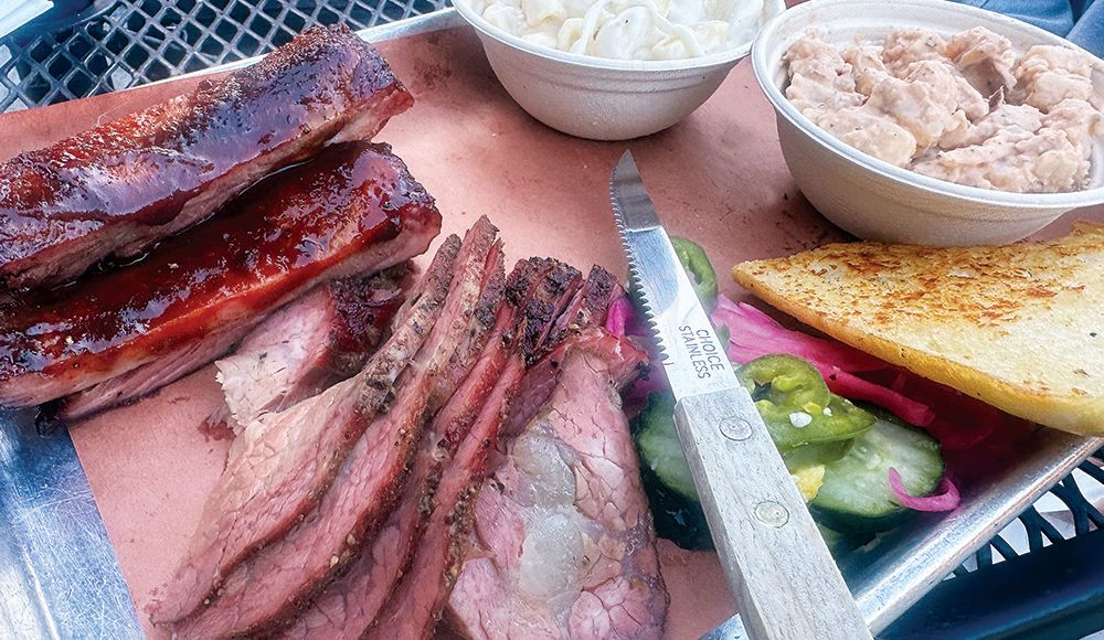 Barbecue pork ribs and tri-tip with potato salad and mac and cheese at Mission St BBQ