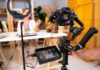 The Rise of Creator Voices in Local Lifestyle Media Woman entrepreneur live streaming craft products on a professional camera